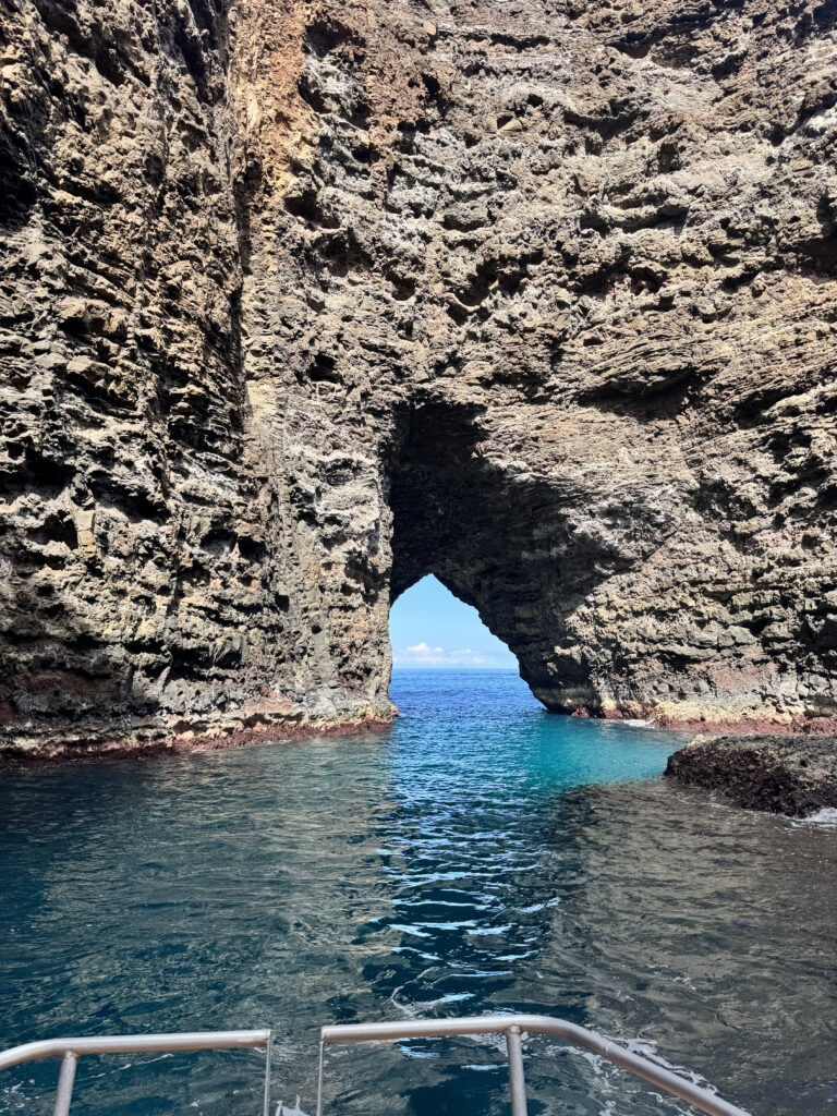 Sea arch rock formation on Na Pali Coast Kauai