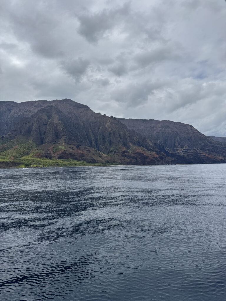 Na Pali Coast with dramatic mountain peaks on a cloudy day