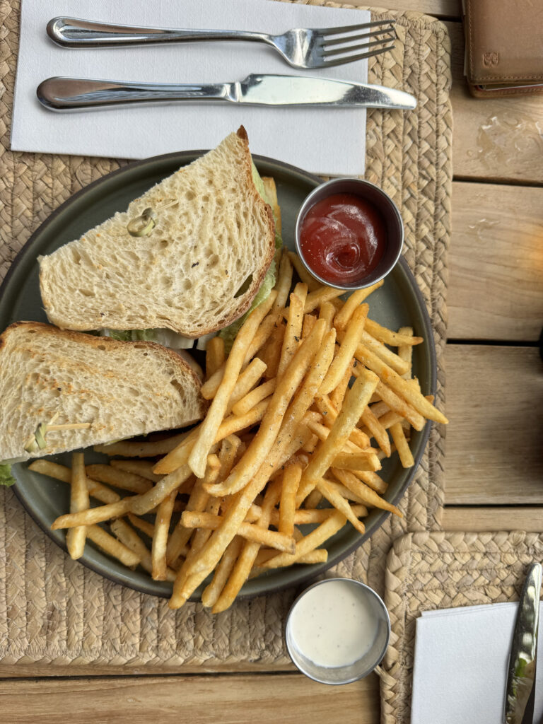 Lunch with club sandwich and fries at 1 Hotel Hanalei Bay