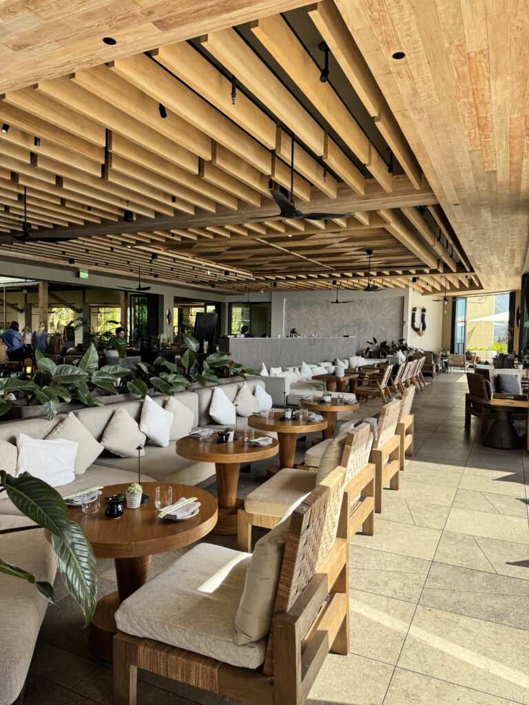 1 Kitchen restaurant interior at 1 Hotel Hanalei Bay with wooden ceiling