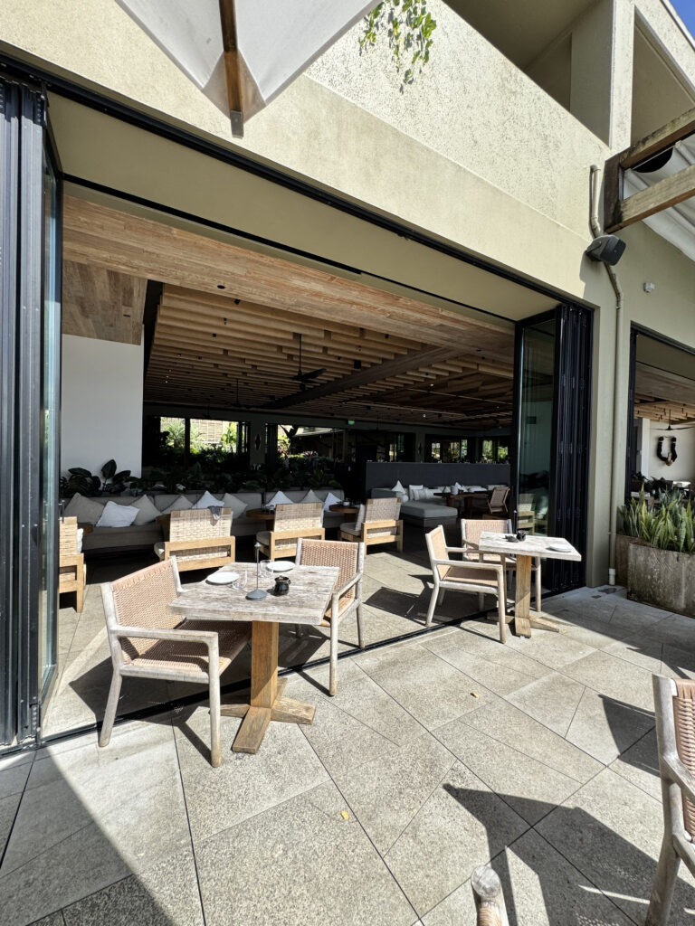 Outdoor dining terrace at 1 Hotel Hanalei Bay